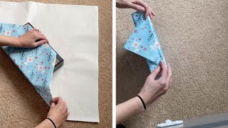 Talented Woman Wraps Gift Without Using Tape