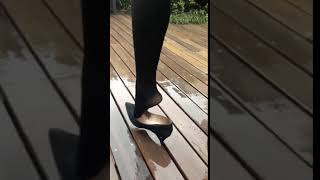 The Girl Showing Her Y Black Nylon Feet When Her High Heels Stuck