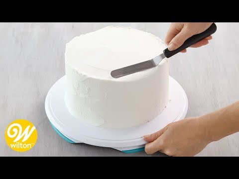 How to Crumb Coat and Ice a Cake Using a Spatula | Wilton
