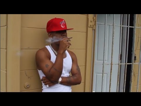 Plies smoking a cigarette (or weed)

