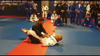 Sid Jacintho Showing A Shoulder Lock Manivela From Closed Guard.