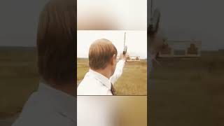 Young Putin With Gun