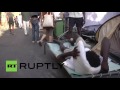 Italy: Refugees continue to arrive at makeshift camp in Rome