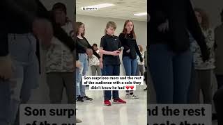 Son surprises mom and the rest of the audience with a solo they didn’t know he h