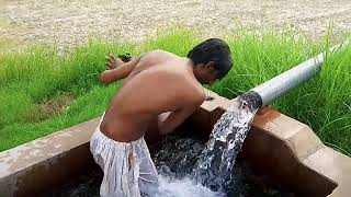 A Young Boy Bathing In Tubewell Watsap No.0301 5219568