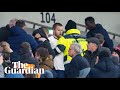 Eric Dier climbs into stands and confronts fan after Tottenha...