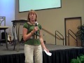 Pam Phelps giving the Charge for Eric & Kimmie Blakely as they move to China