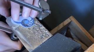 Piercing a Nautilus Pendant