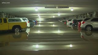 Cars submerged at Dallas Love Field parking garage after heavy rainfall