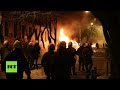 Greek rioters clash with police, hurl petrol bombs, torch cars during anti-prison protest