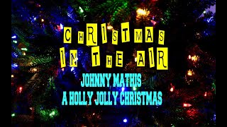 Watch Johnny Mathis Holly Jolly Christmas video