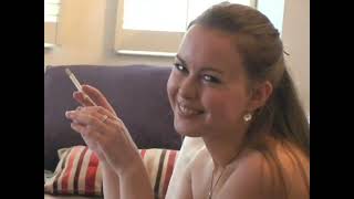 Cute Girl Smoking In Couch