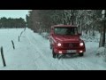 Roter Mercedes G im Schnee (HD)