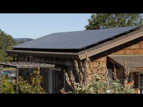 Paul the owner of this home shows us the Solar Thermal Panels that heat