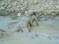 MessyModel: Laura and Kitto in paint and wet mud
