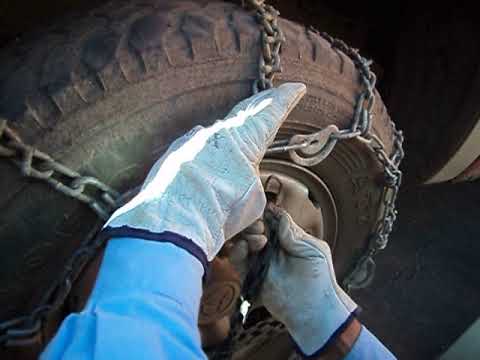 Colocacion de cadenas en faena caserones.AVI