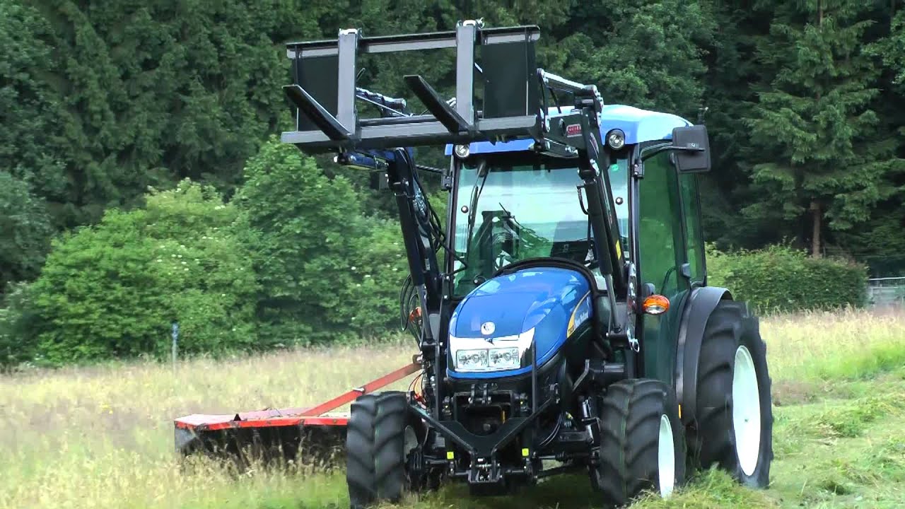 New Holland T3030 mit Stoll FC350 Frontlader, Kuhn Kreiselmähwerk