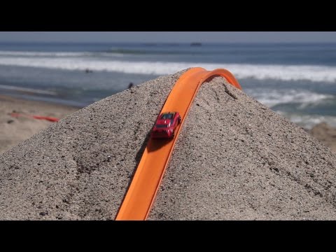 Hot Wheels Beach Track We spent a day at the beach to build aWe spent a day at the beach to build aHot Wheelstrack in the sand. The car drops down a hill, races down the sandy track, drops ...