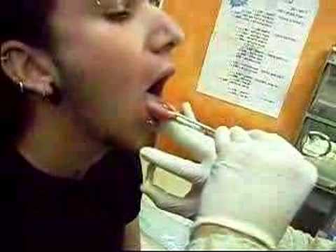 Me, getting my first tongue piercing. www.myspace.com/roteml