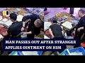 Man passes out after stranger in China applies mysterious ointment on his back