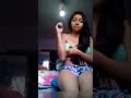girl removing bra on camera