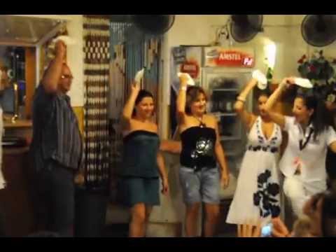 Smashing Plates in Santorini, Greece