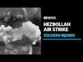 Hezbollah air strike injures 14 Israeli soldiers as IDF weighs response to Iran  | ABC News