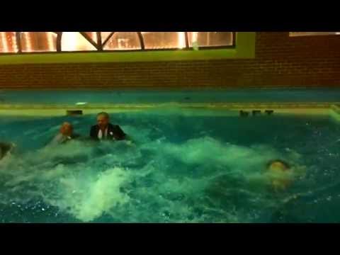 Bridal party jump in pool with clothes on!