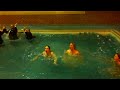 Bridal party jump in pool with clothes on!