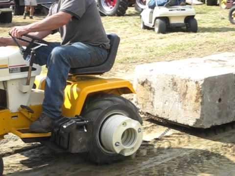 cub cadet pulling stone boat 6000 pounds (many times) red 582 garden tractor puller 3100 Lbs In 1800 Lb Class