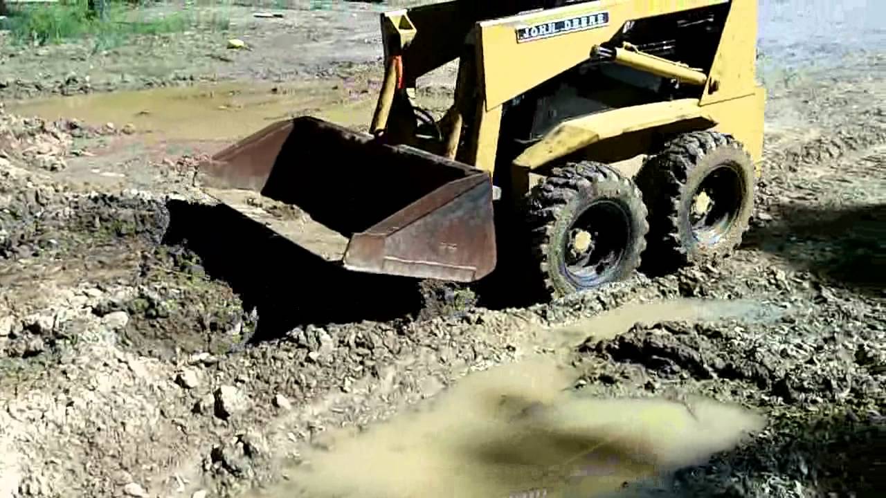 JD 24A Skid Steer 04 06 12 YouTube