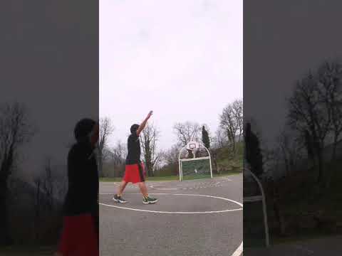 Man Makes Impressive Basketball Shot While Performing Karate Moves - 1201079