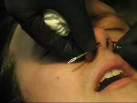 Septum Piercing with Ten Gauge Jewelry. This is me getting my septum pierced 