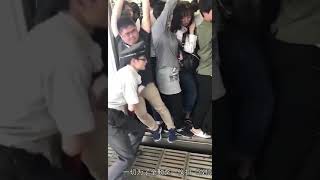 Tokyo local train pushers