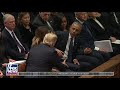 Trumps greet Obamas at President George H.W. Bush's funeral
