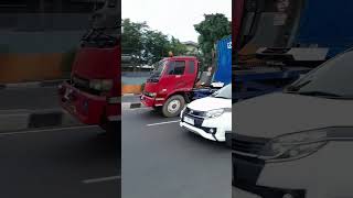 Blue Container Truck Maneuvering