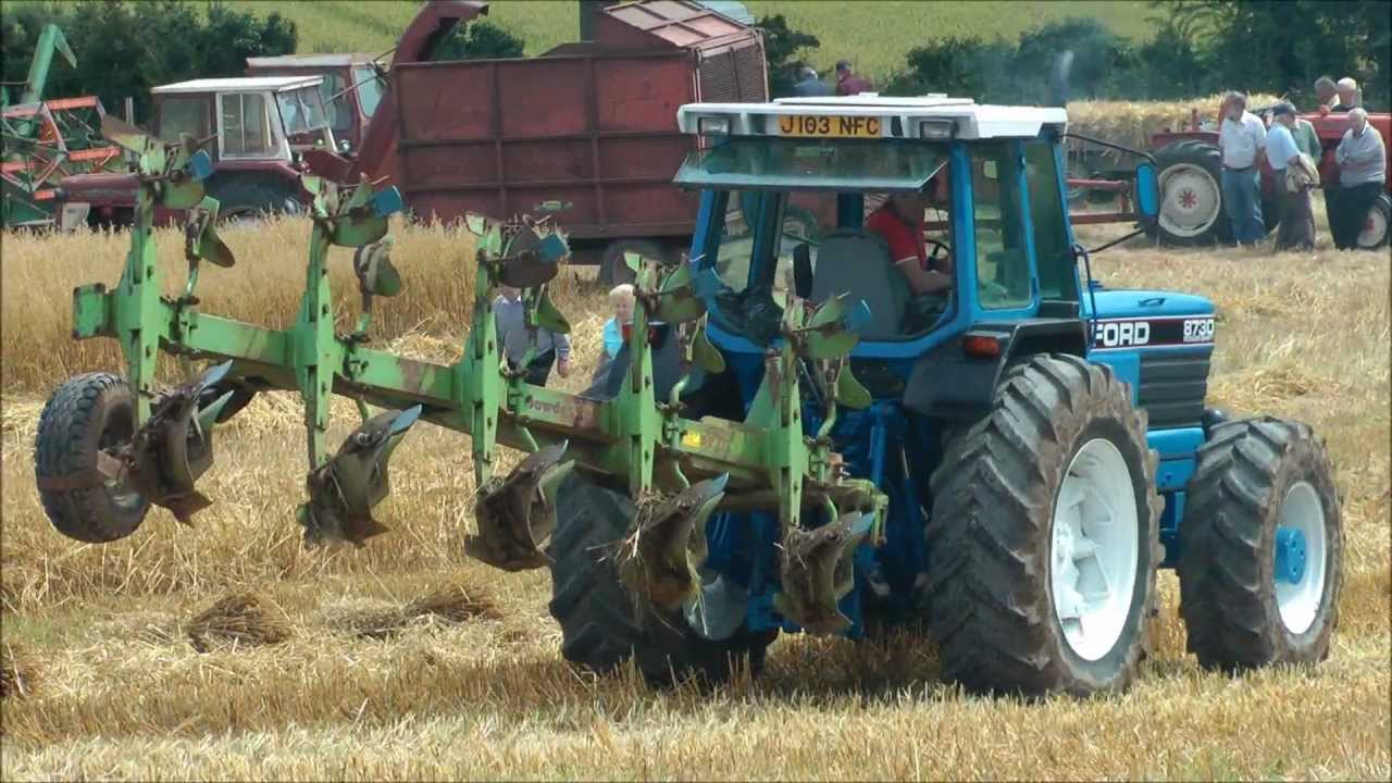 Big Ford tractor ploughing - YouTube