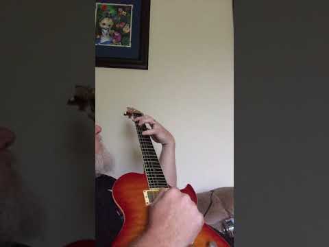 "Baker Street" by Gerry Rafferty, performed by Ben Lacy.