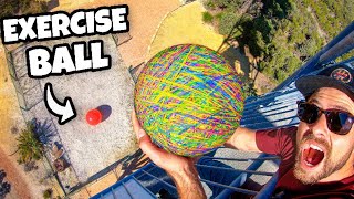 Rubber Band Ball Vs. World’s Largest Exercise Ball From 45M!