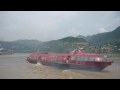 Red Russian Hydrofoil Pulling Out Of Dock