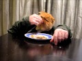 Cat Eating with Hands