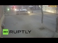 Inch from death: CCTV captures Russian pensioner's miracle escape from car/truck smash