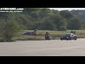 BMW S1000RR wheelie next to Bugatti Veyron Vitesse 1200 HP