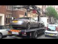 Aston Martin DB9 Volante being lifted and towed away in Knightsbridge, London