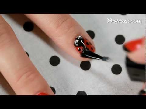 Learn how to create a ladybug nail design in this nail art tutorial Learn how to create a ladybug nail design in this nail art tutorial