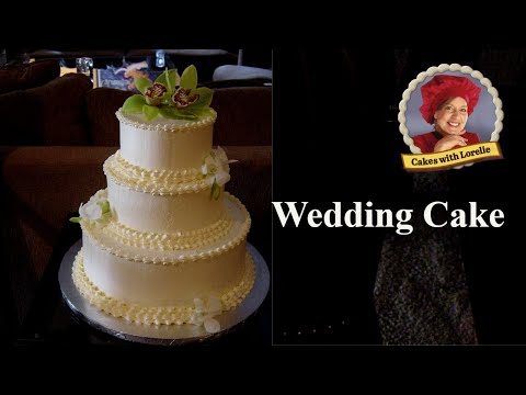 A three tiered wedding cake Carrot cake with cream cheese filling