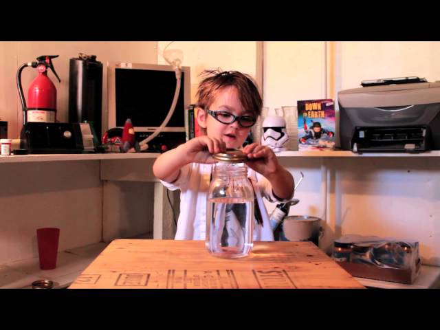 Little Kid Makes Tornado In A Jar Science Experiment - Video