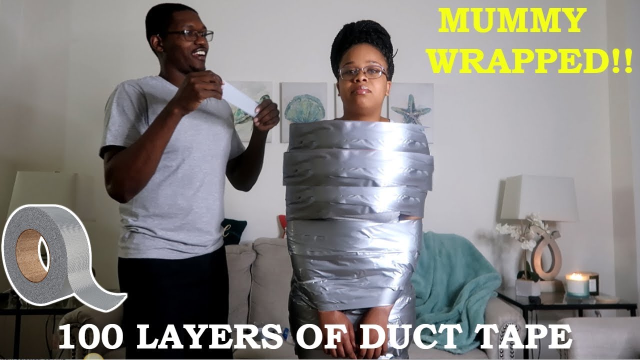 Guy wraps girlfriend duct tape