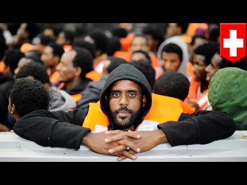 Italy picks up 700 boat migrants, says rescue operations ongoing.
