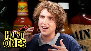 Andrew Callaghan Goes For the Marrow While Eating Spicy Wings | Hot Ones